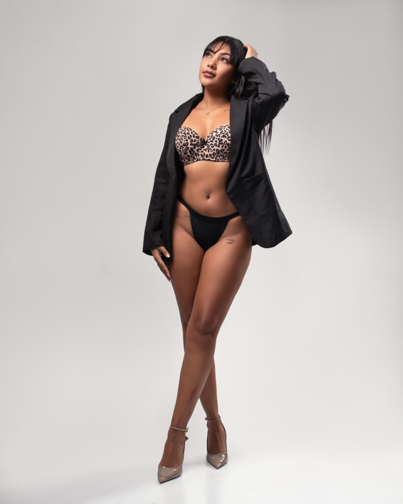Cielo, 22 year old escort poses with her legs crossed and one hand resting on her head at Velazquez24 Cielo, 22 year old escort poses with her legs crossed and one hand resting on her head at Velazquez24